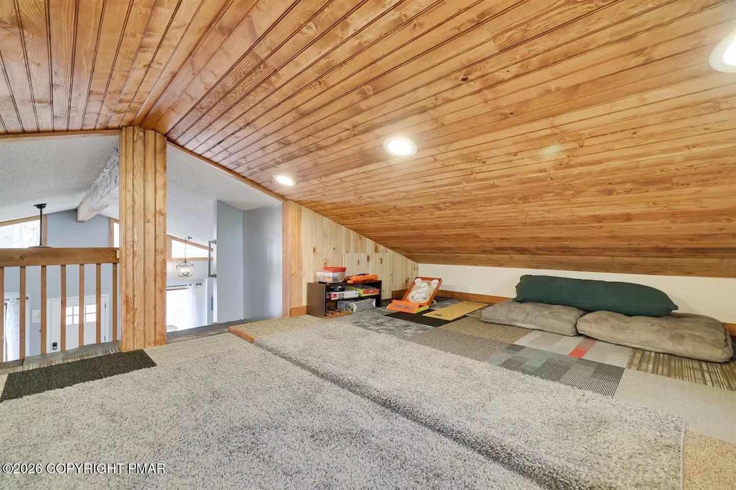 242 St Andrews Drive Bushkill, PA 18324 - Photo 28 of 36 a view of a hallway with seating space