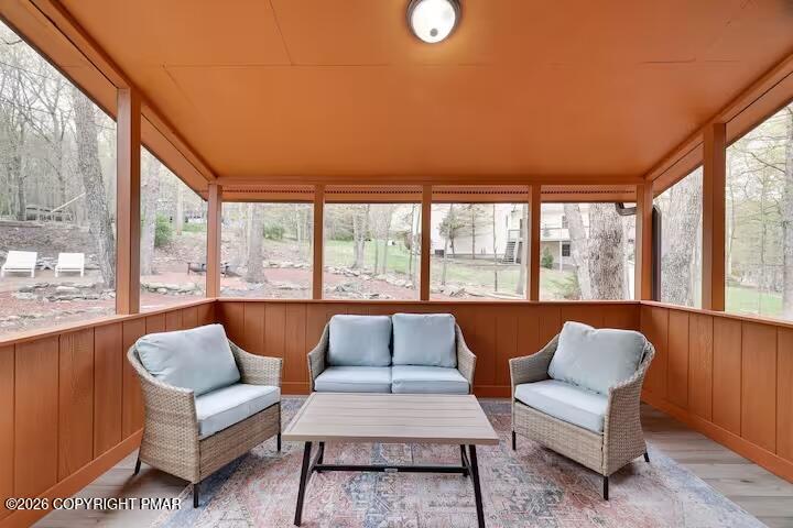 242 St Andrews Drive Bushkill, PA 18324 - Photo 29 of 36 a living room with furniture and a large window