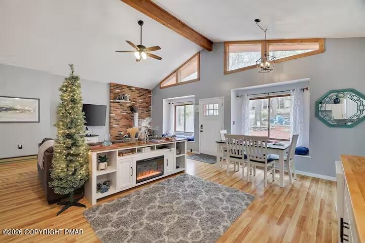 242 St Andrews Drive Bushkill, PA 18324 - Photo 8 of 36 a living room with furniture and a fireplace