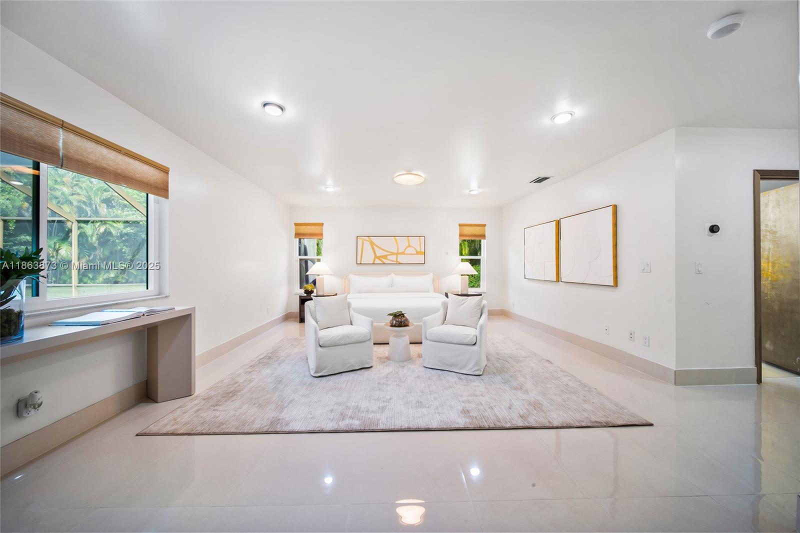 6125 Southwest 109th Street Pinecrest, FL 33156 - Photo 20 of 40 a living room with furniture and window