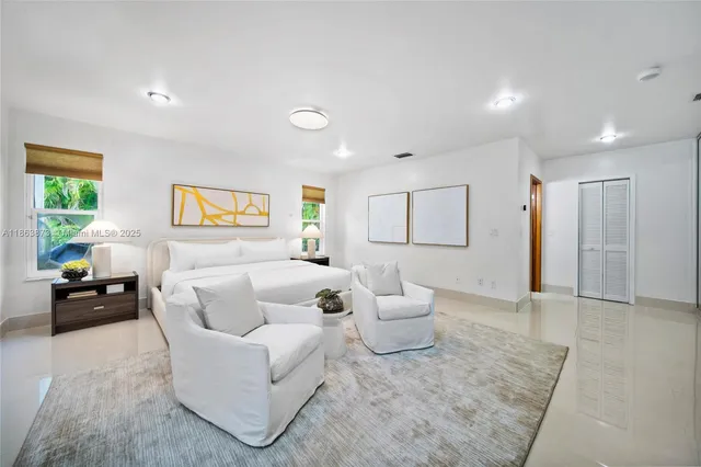 a living room with furniture and a couch