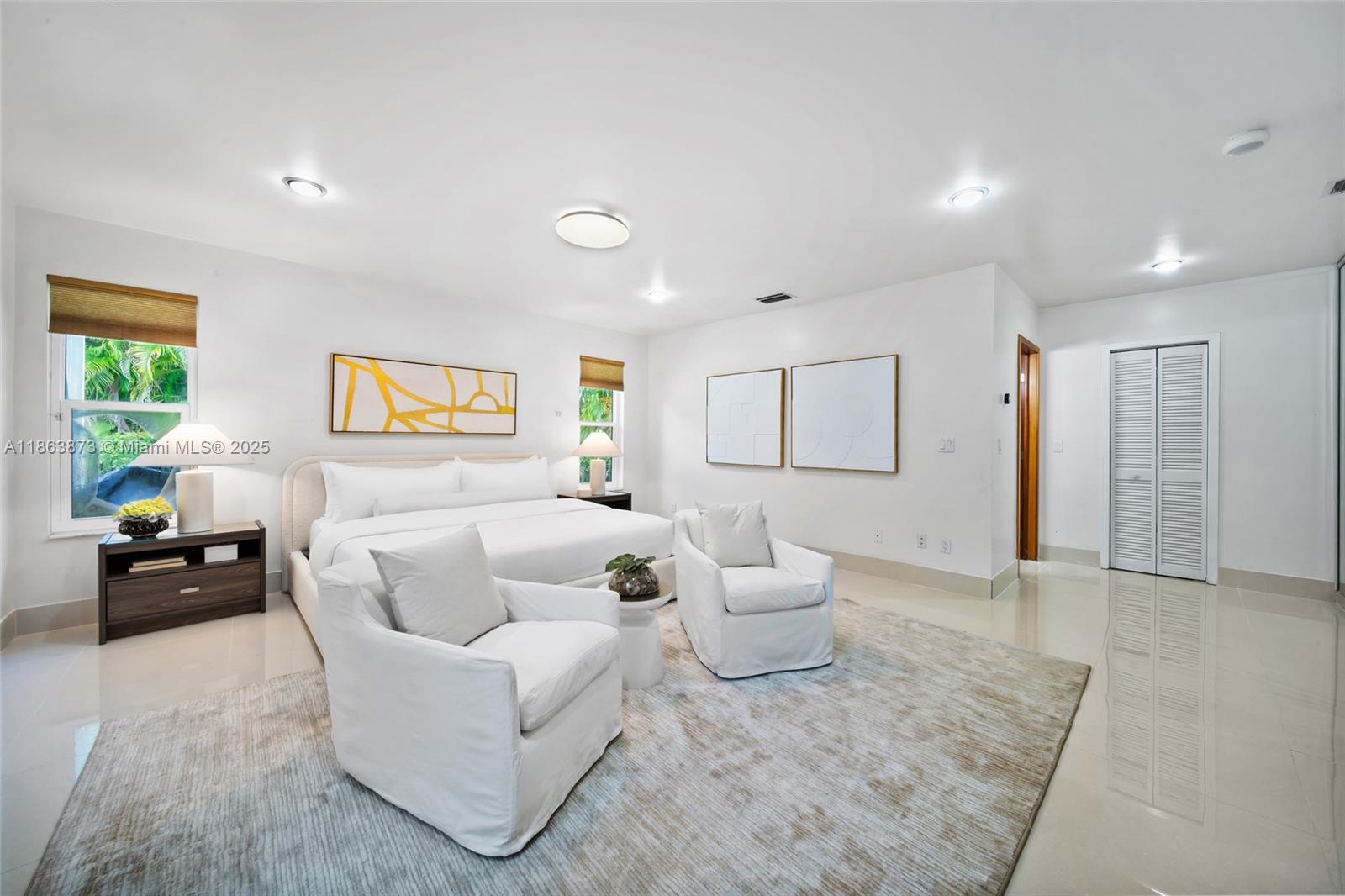 6125 Southwest 109th Street Pinecrest, FL 33156 - Photo 21 of 40 a living room with furniture and a couch