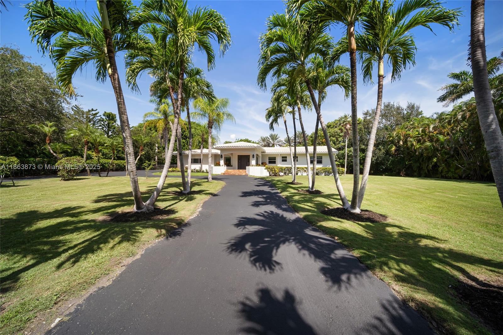 6125 Southwest 109th Street Pinecrest, FL 33156 - Photo 4 of 40 a view of a park with palm trees