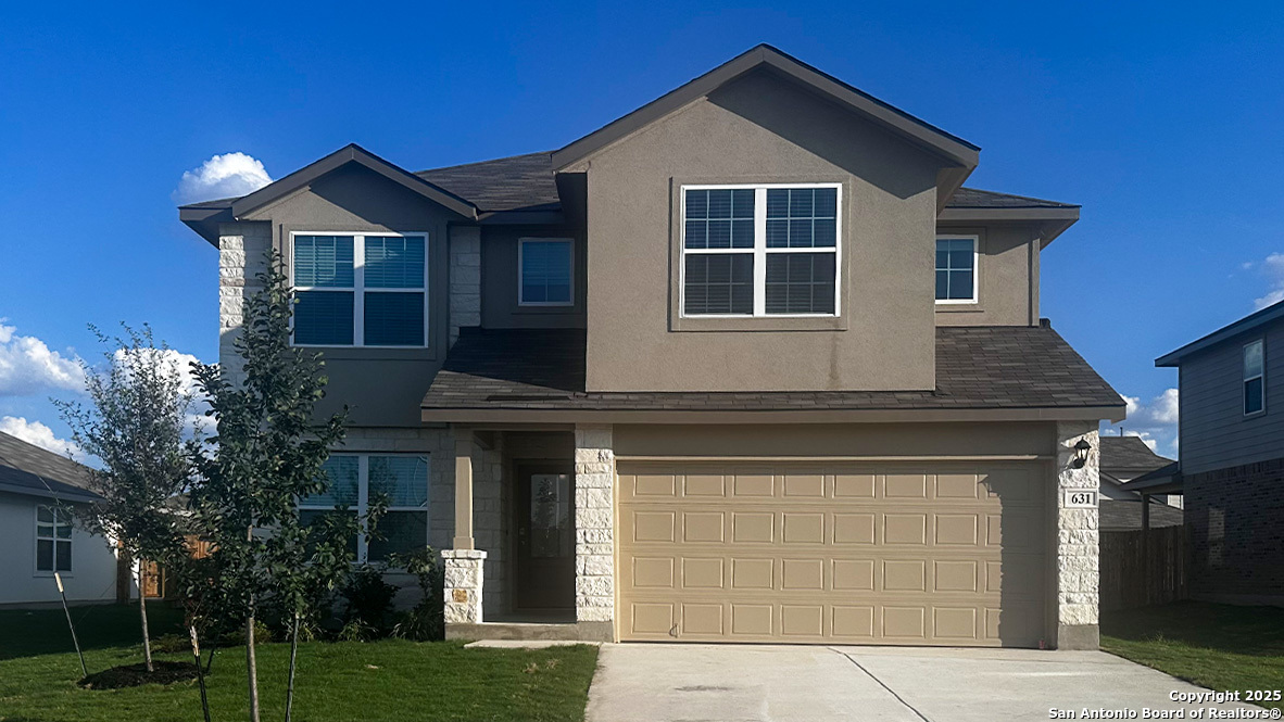a house view with a garden space