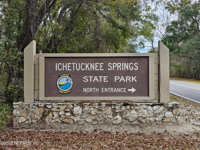 a sign broad on the side of the road