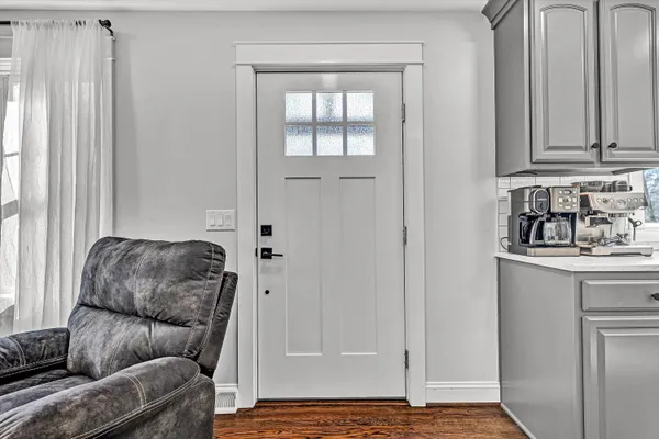 a living room with furniture and window