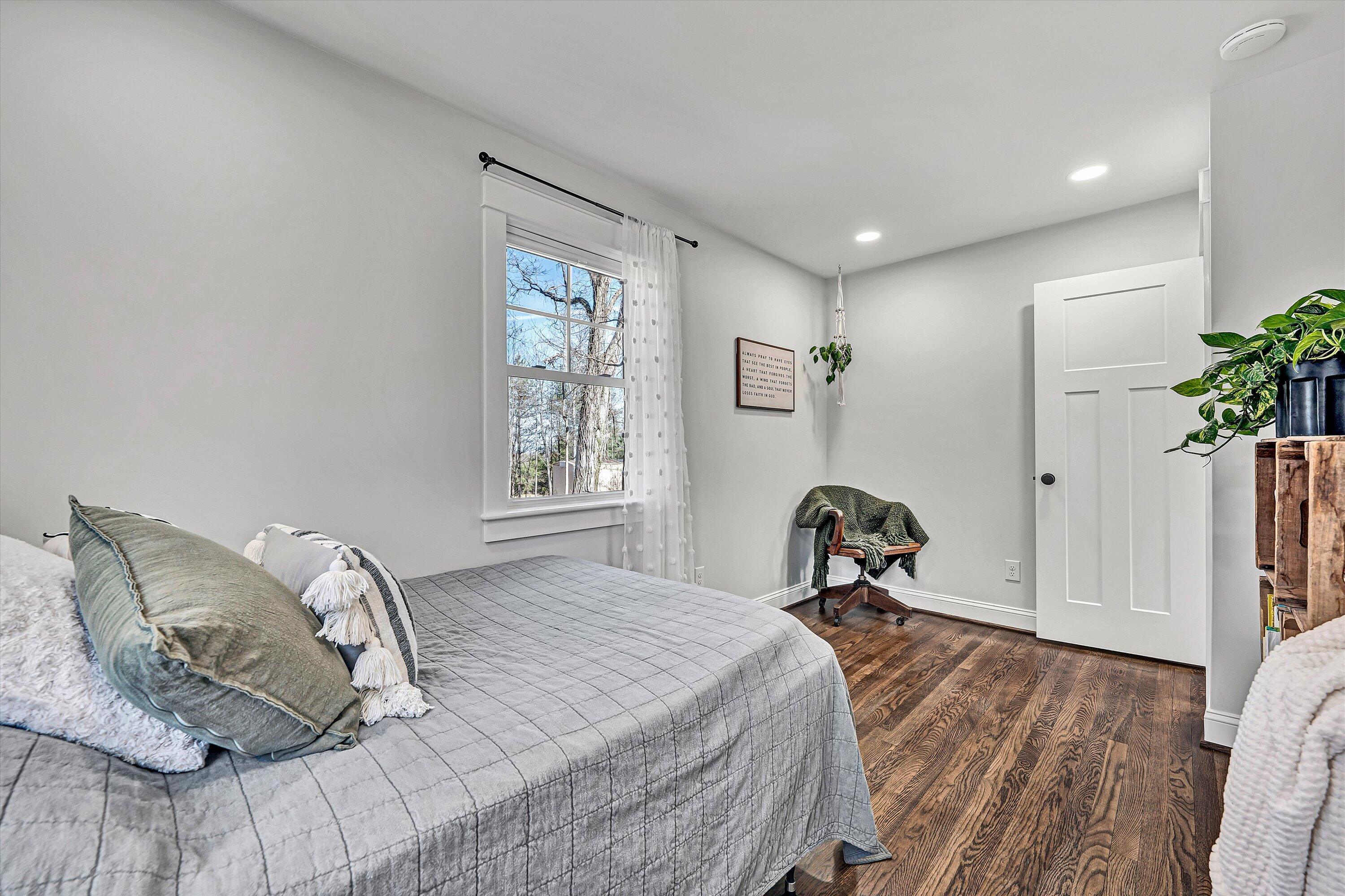 1990 Edwardsville Road Hardy, VA 24101 - Photo 24 of 45 a bedroom with a bed and wooden floor
