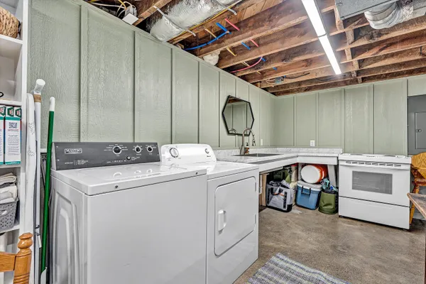 a utility room with dryer and washer