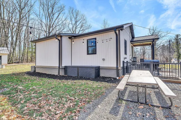 a view of a back yard of the house
