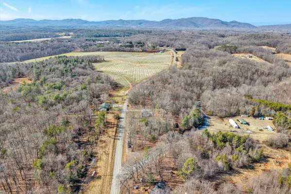 a view of a lake with mountains in the background