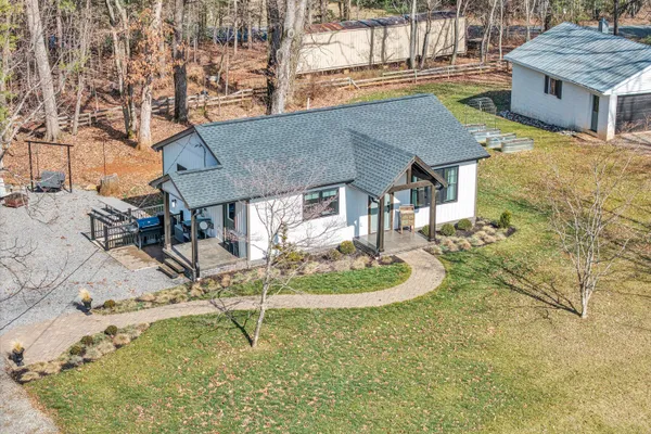 a aerial view of a house with entertaining space