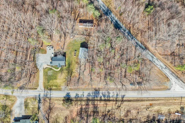 a view of swimming pool with a yard