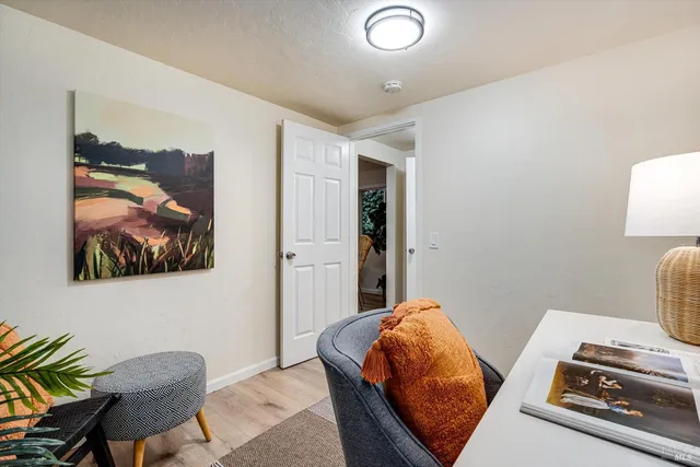 a bedroom with a bed and furniture