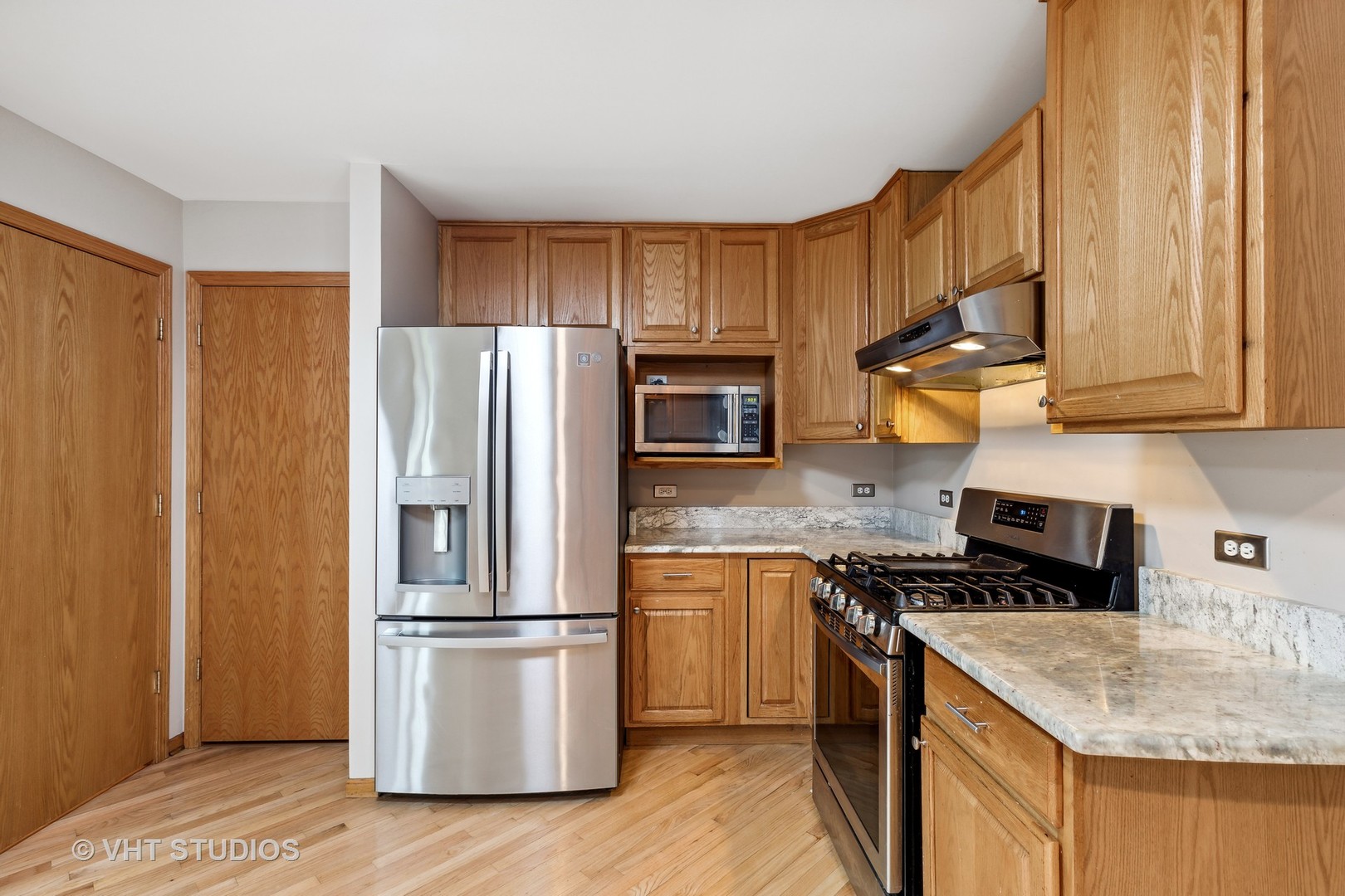 23 West Richton Road Crete, IL 60417 - Photo 8 of 35 a kitchen with stainless steel appliances granite countertop a refrigerator stove and sink