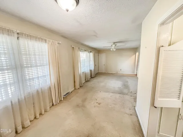 a view of a hallway with workspace