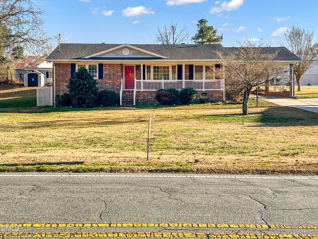 a view of a house with a ocean view