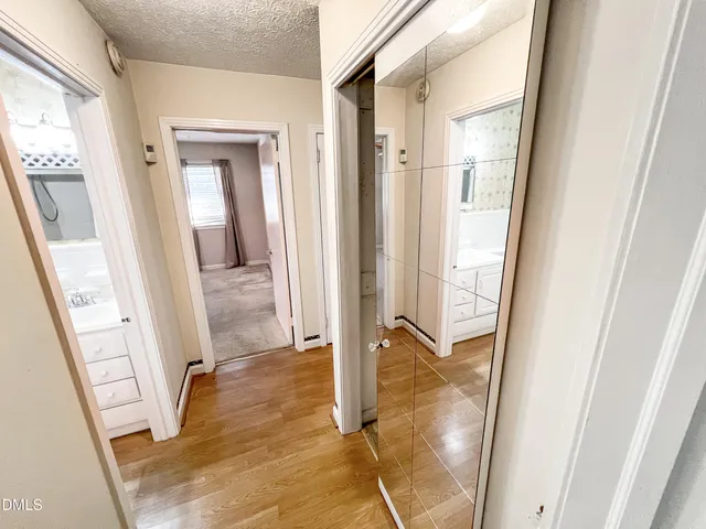 a view of a backyard with sitting area