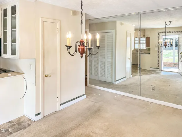 a view of a bathroom with a glass shower door