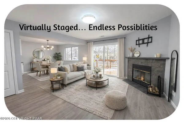 a view of a livingroom with a fireplace