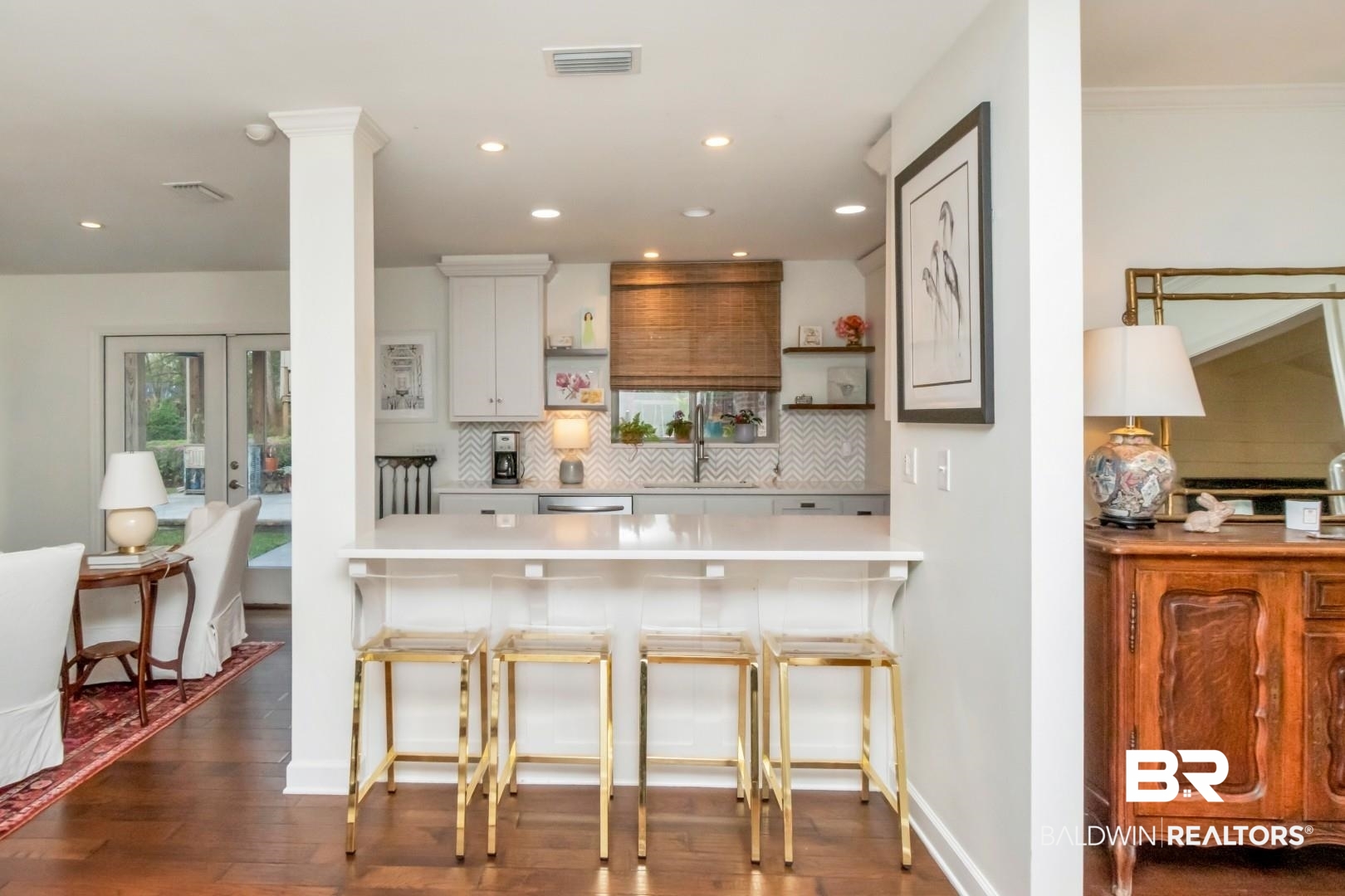 154 Fenwick Road Mobile, AL 36608 - Photo 13 of 48 Kitchen featuring a breakfast bar area, dark wood finished floors, a peninsula, tasteful backsplash, and recessed lighting