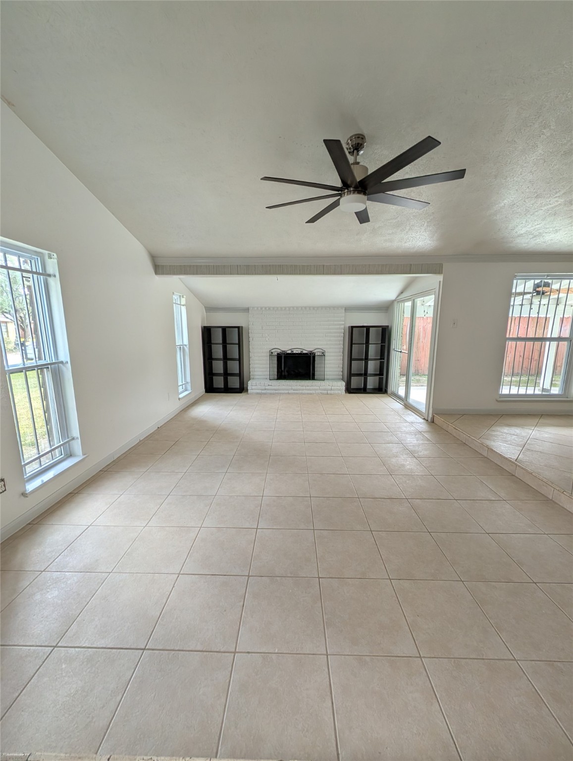 5903 Graycliff Drive Houston, TX 77049 - Photo 2 of 14 a view of a livingroom with a ceiling fan and window
