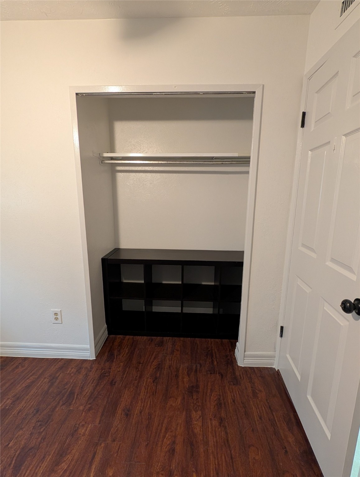 5903 Graycliff Drive Houston, TX 77049 - Photo 8 of 14 a view of walk in closet with empty racks