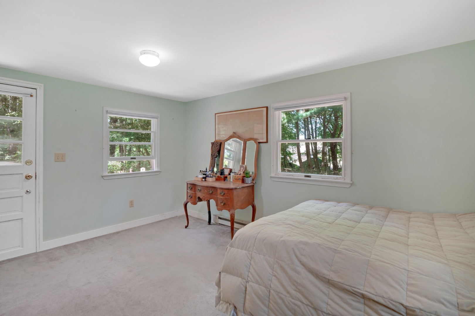 21 Clay Pit Road Edgartown, MA 02539 - Photo 11 of 20 a bedroom with a bed and a window