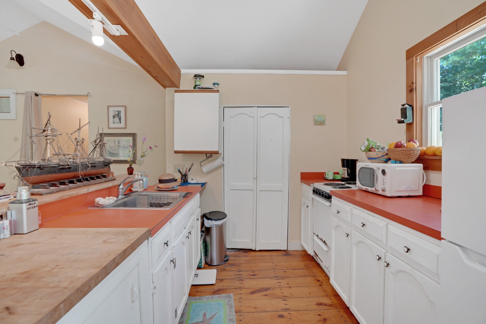 21 Clay Pit Road Edgartown, MA 02539 - Photo 8 of 20 a kitchen with stainless steel appliances granite countertop a sink stove and refrigerator