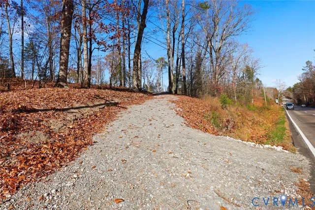 a view of large space with trees
