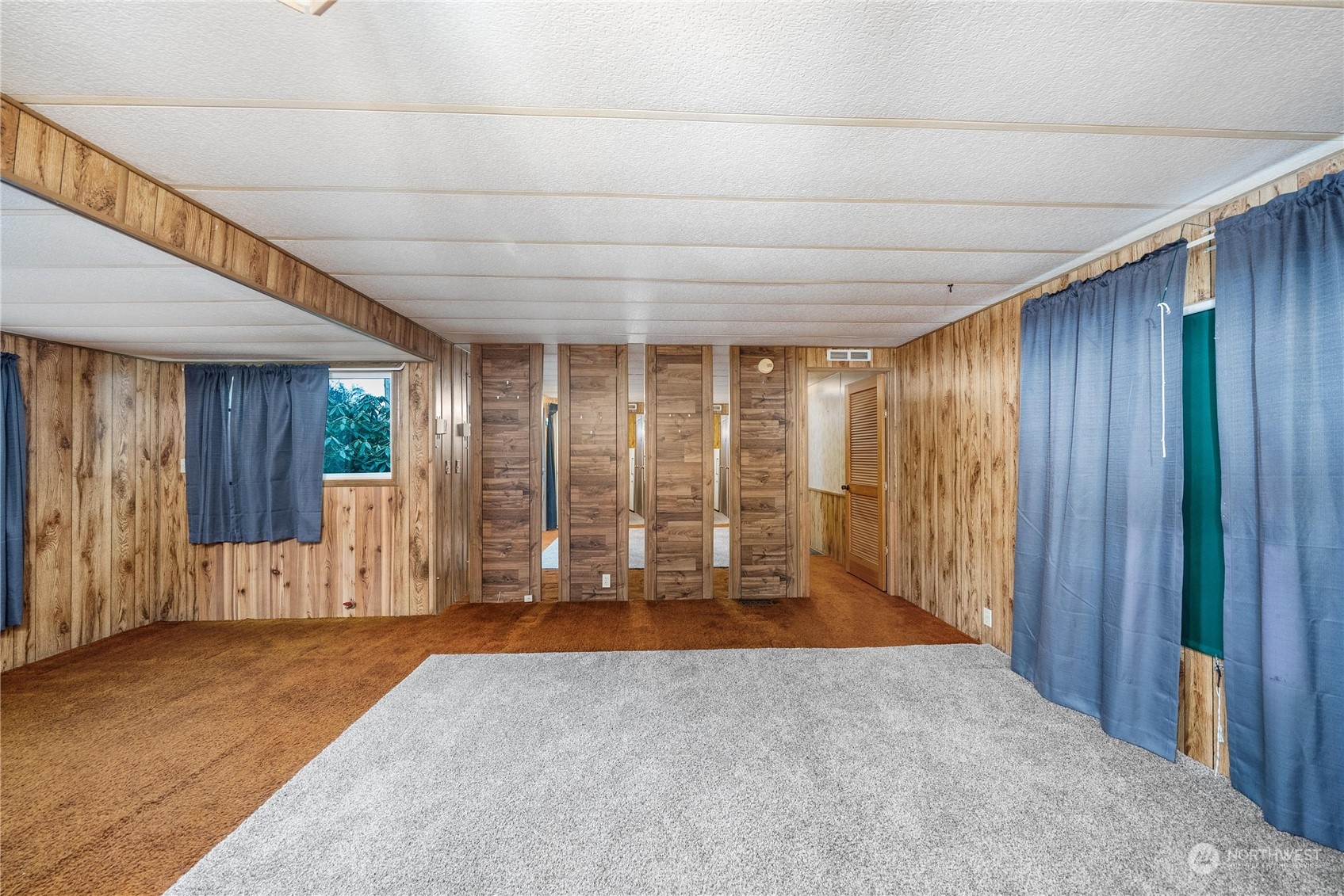 321 2nd Street Roy, WA 98580 - Photo 4 of 16 an empty room with large windows