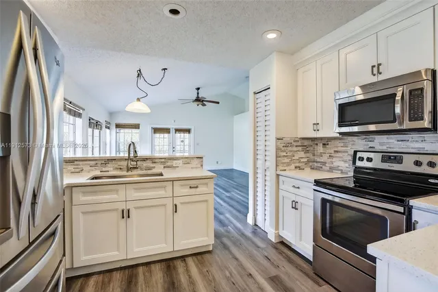 $619,000 | 8800 Lake Park Circle North, Davie, FL 33328