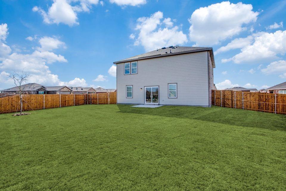 1917 Briar Cove Anna, TX 75409 - Photo 9 of 10 a view of a backyard with a garden