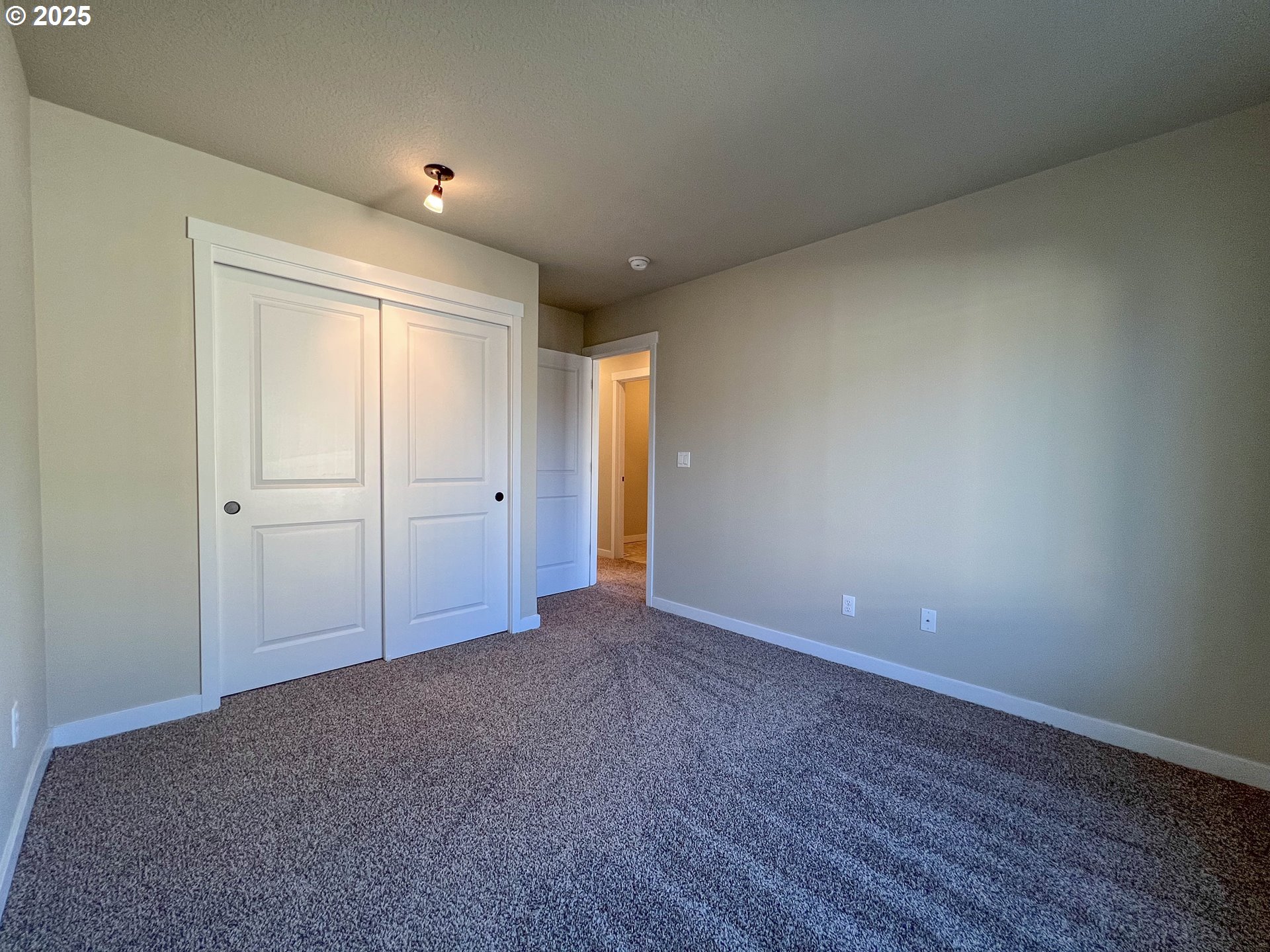386 Southwest 203rd Terrace Beaverton, OR 97006 - Photo 17 of 24 a view of an empty room