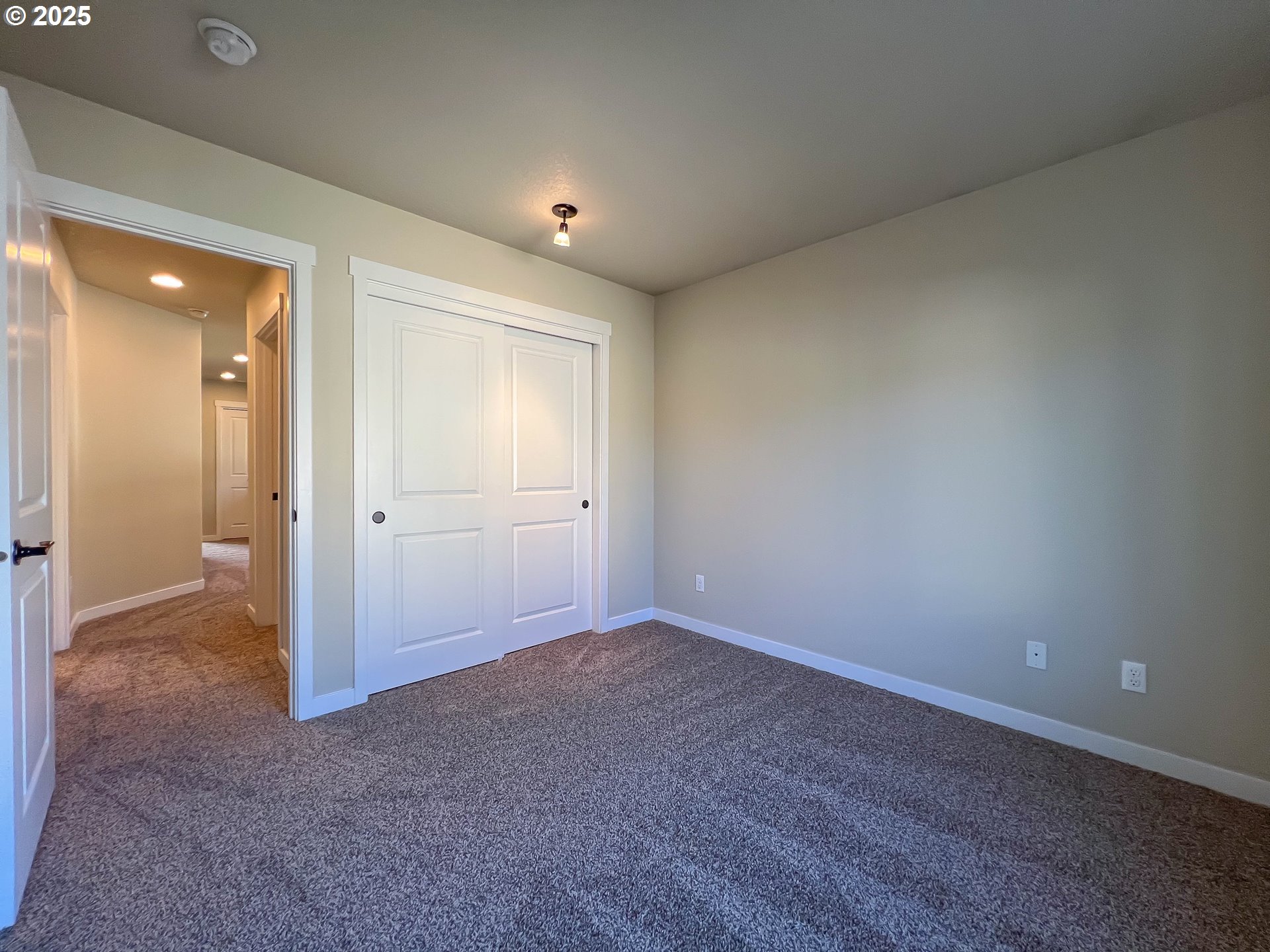 386 Southwest 203rd Terrace Beaverton, OR 97006 - Photo 19 of 24 an empty room with closet area