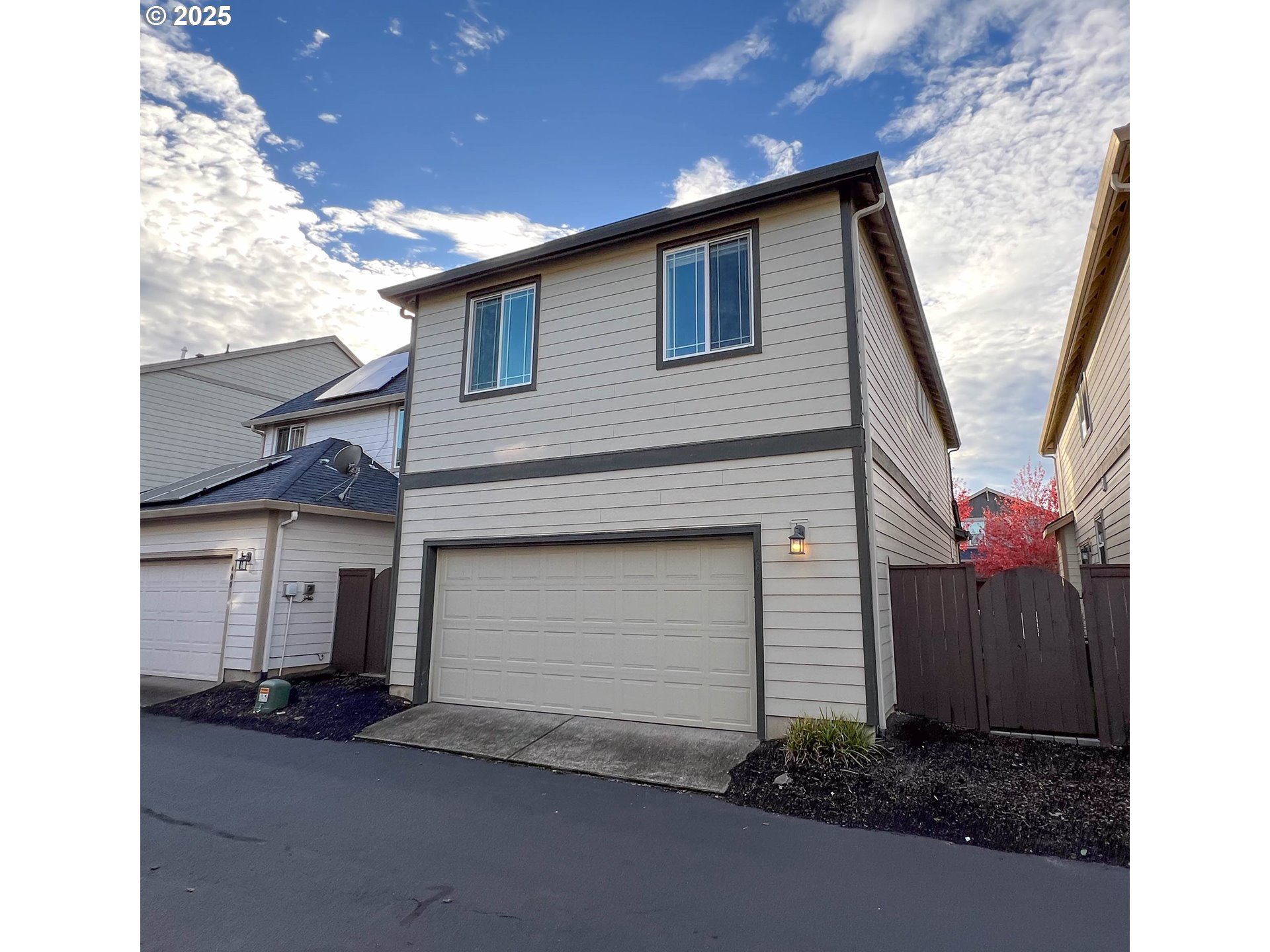 386 Southwest 203rd Terrace Beaverton, OR 97006 - Photo 20 of 24 a front view of a house with a garage
