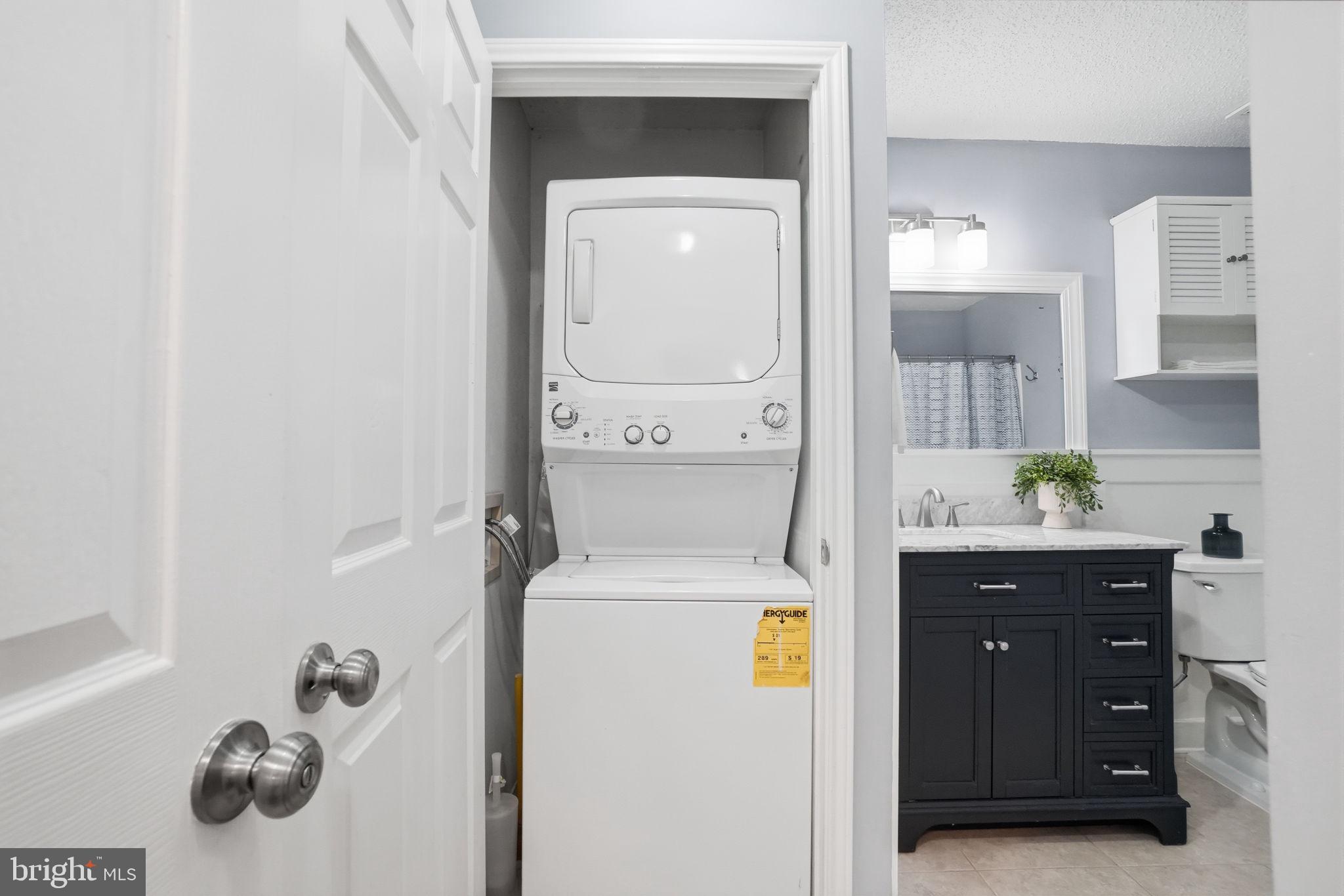 20960 Timber Ridge Terrace, Unit 303 Ashburn, VA 20147 - Photo 19 of 32 Indoor laundry (washer/dryer stacked combo)