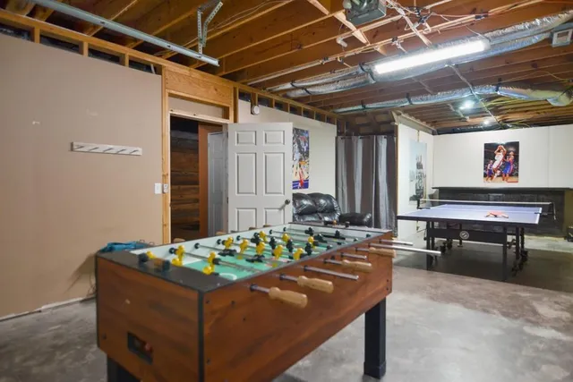 a room with table and chairs