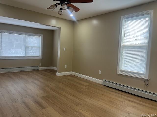 85-40 111th Street, Unit 2 Queens, NY 11418 - Photo 20 of 21 an empty room with a window
