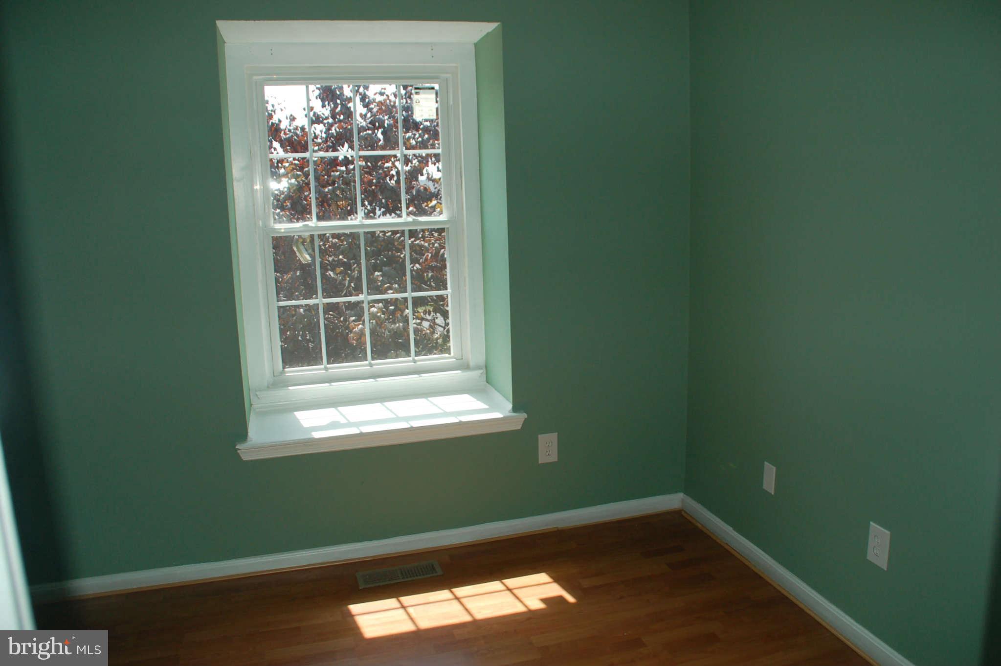 13982 New Braddock Road Centreville, VA 20121 - Photo 12 of 16 a view of a room that has a window in it