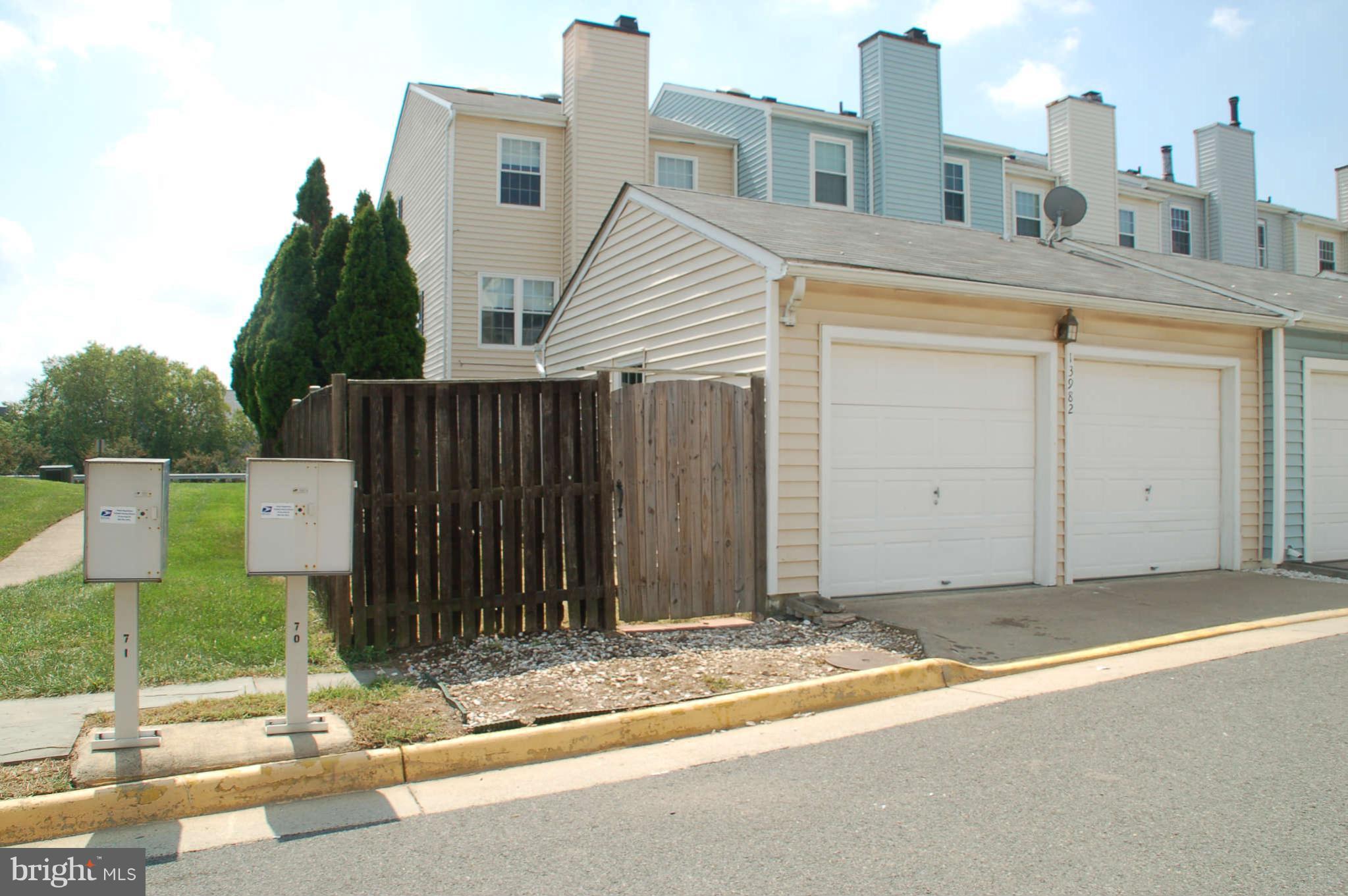 13982 New Braddock Road Centreville, VA 20121 - Photo 16 of 16 a view of a house with a backyard
