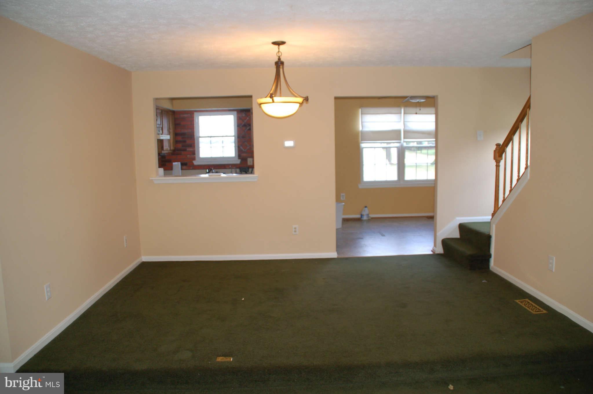 13982 New Braddock Road Centreville, VA 20121 - Photo 4 of 16 wooden floor in an empty room with a window