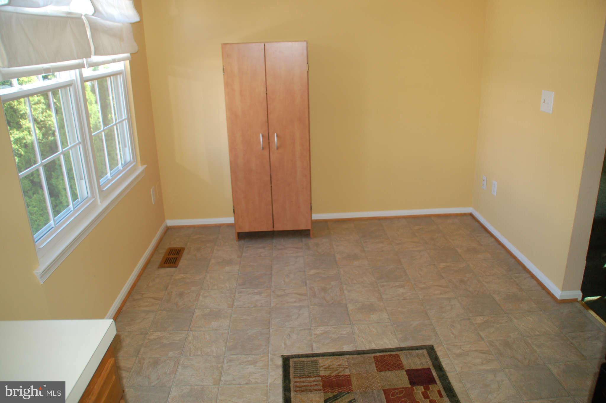 13982 New Braddock Road Centreville, VA 20121 - Photo 7 of 16 a view of an empty room