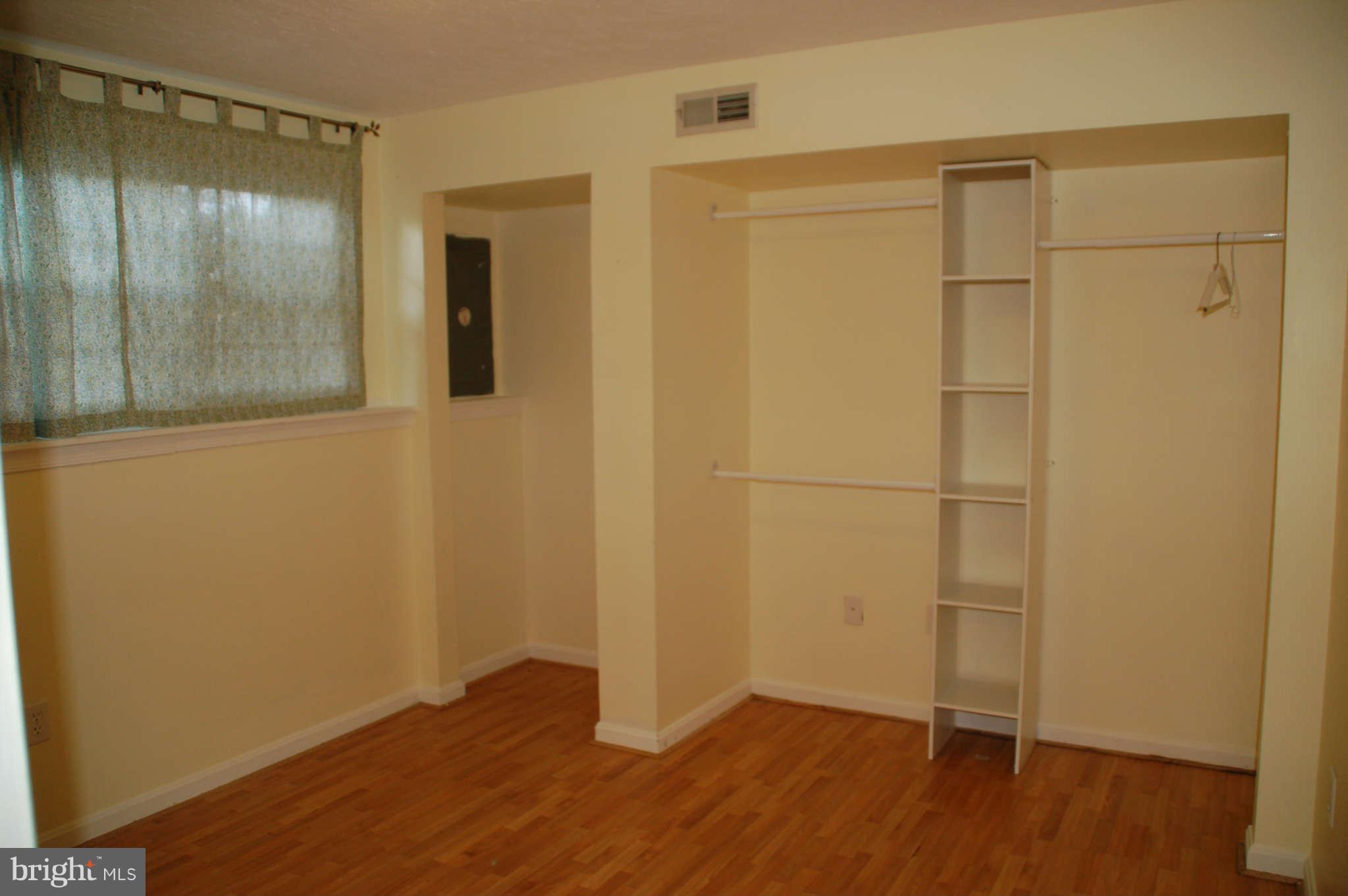 13982 New Braddock Road Centreville, VA 20121 - Photo 10 of 16 a view of empty room with wooden floor