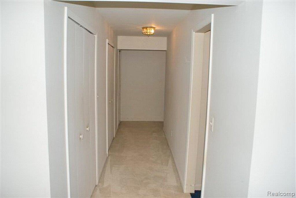 18301 West Thirteen Mile Road, Unit 3 Southfield, MI 48076 - Photo 16 of 23 Hall To Bedrooms Big Closets