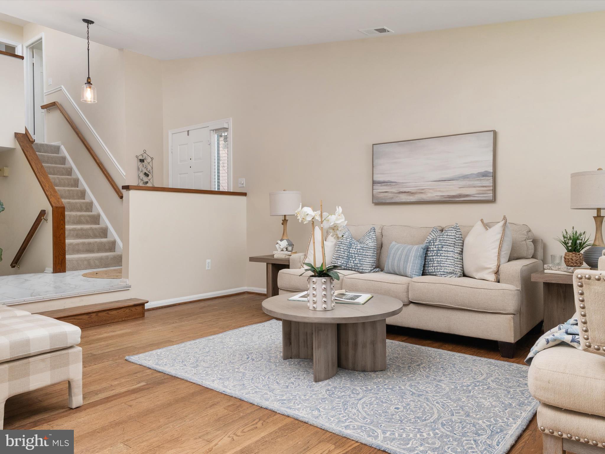 1411 Stonecreek Road Annapolis, MD 21403 - Photo 11 of 38 a living room with furniture and wooden floor