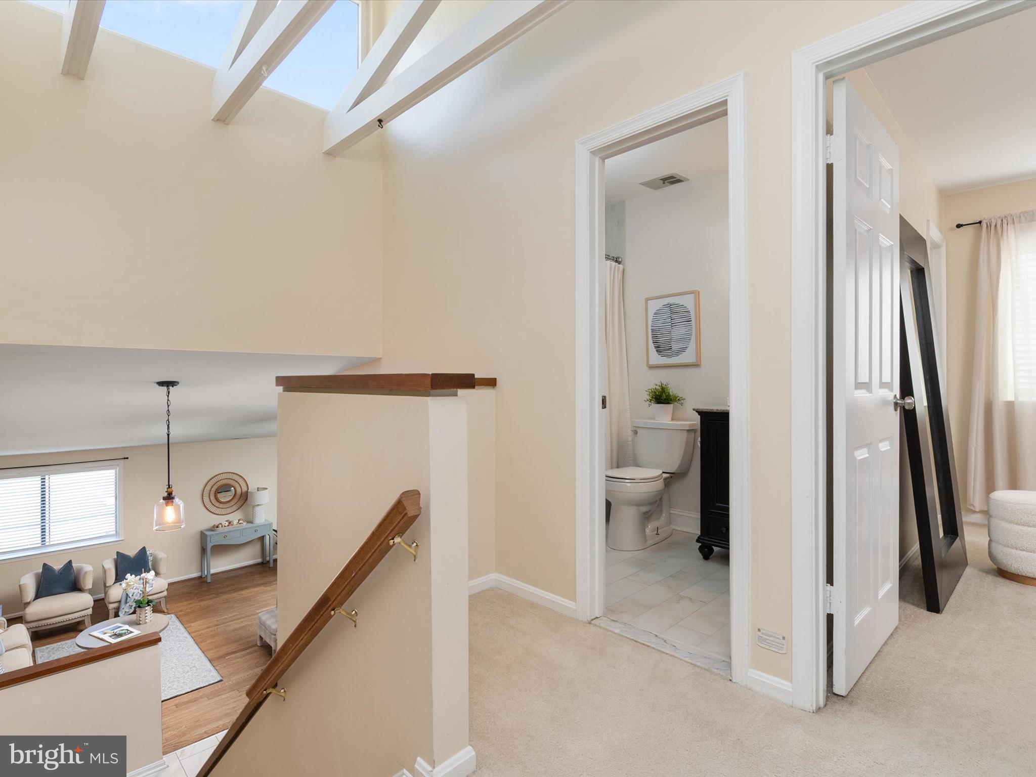 1411 Stonecreek Road Annapolis, MD 21403 - Photo 25 of 38 a view of a hallway to the livingroom and a couch