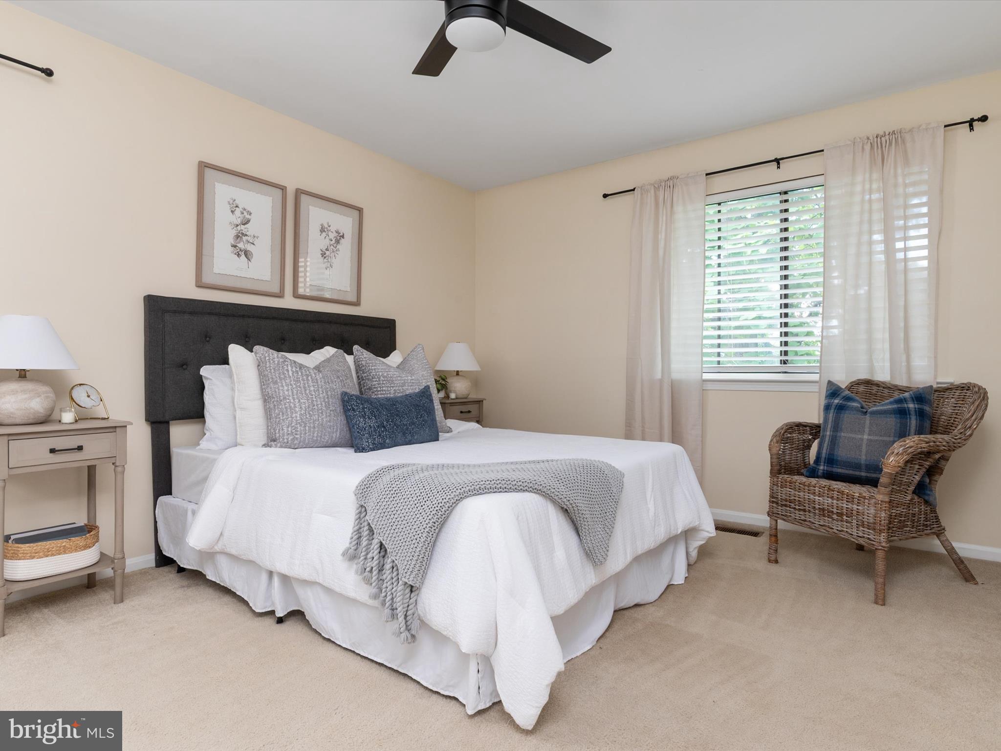 1411 Stonecreek Road Annapolis, MD 21403 - Photo 26 of 38 a spacious bedroom with a bed and a couch