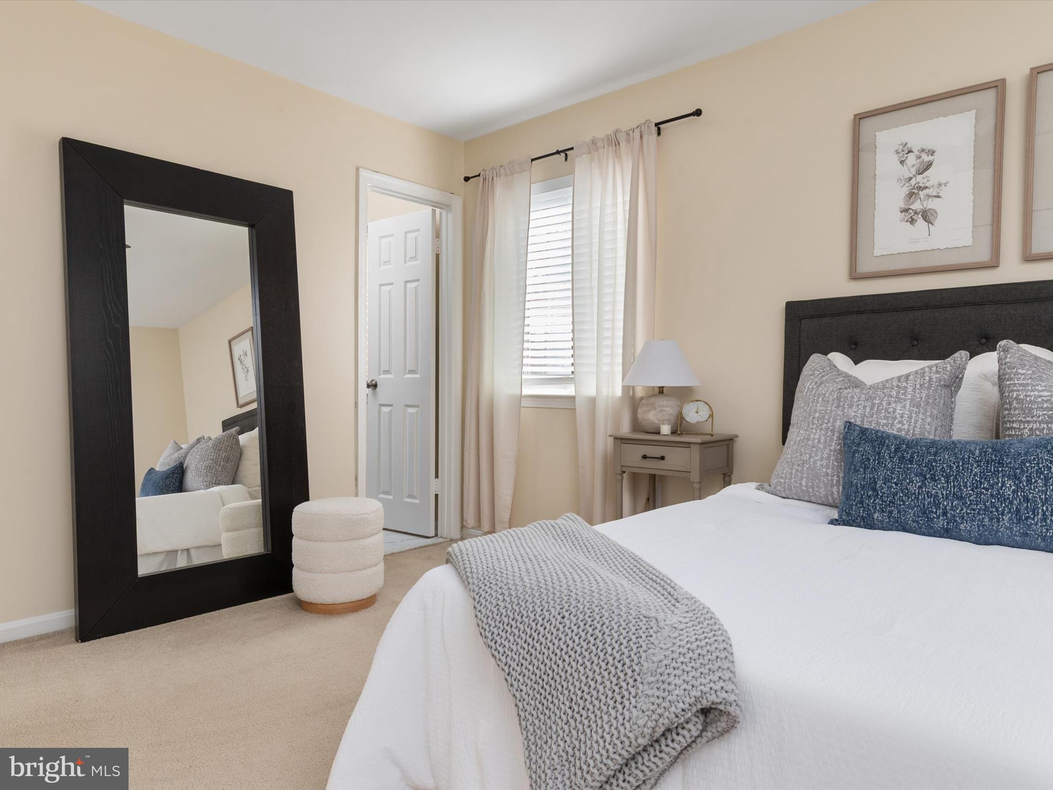 1411 Stonecreek Road Annapolis, MD 21403 - Photo 28 of 38 a bedroom with a bed and a view of bathroom