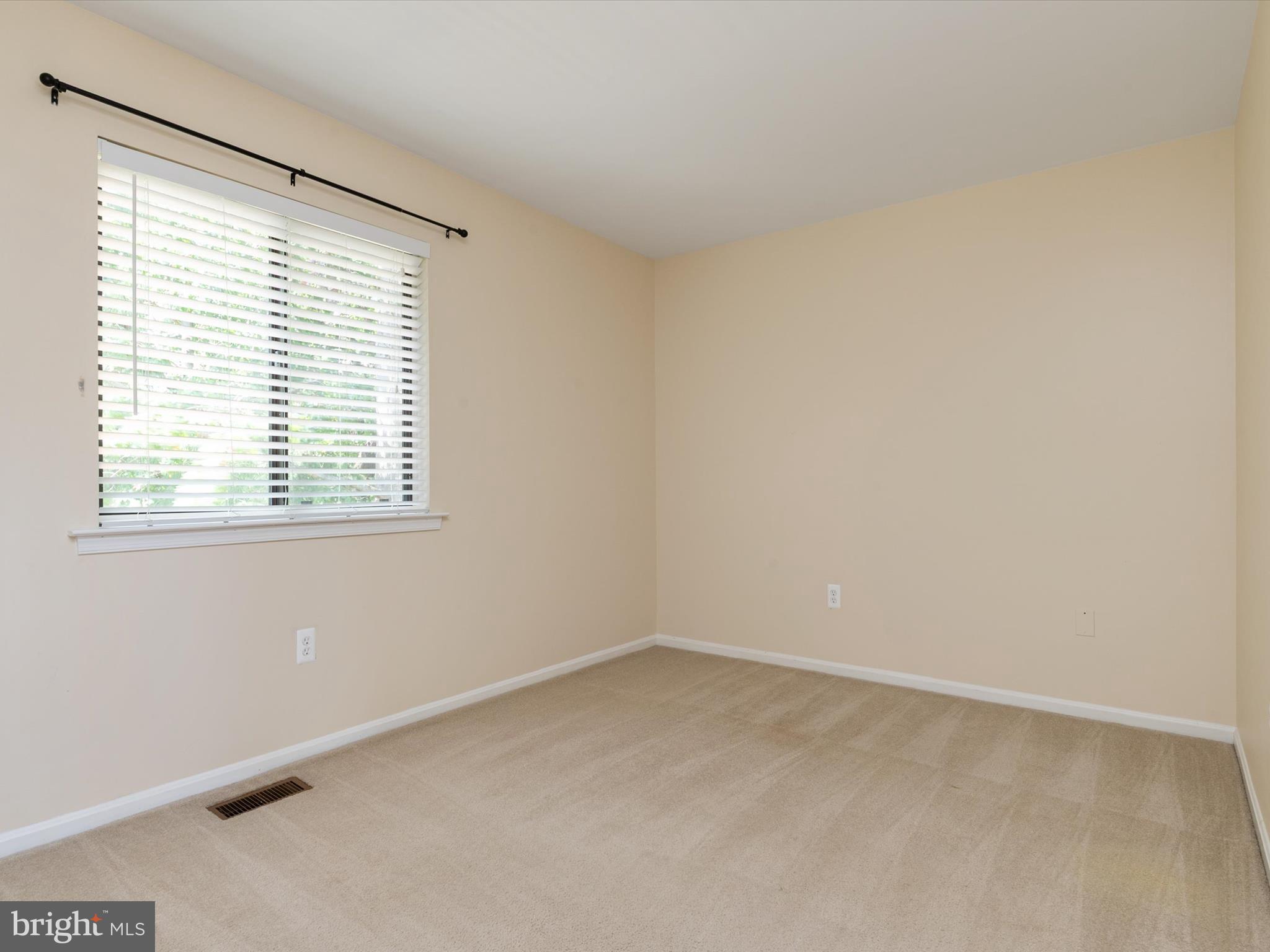 1411 Stonecreek Road Annapolis, MD 21403 - Photo 30 of 38 an empty room with a window