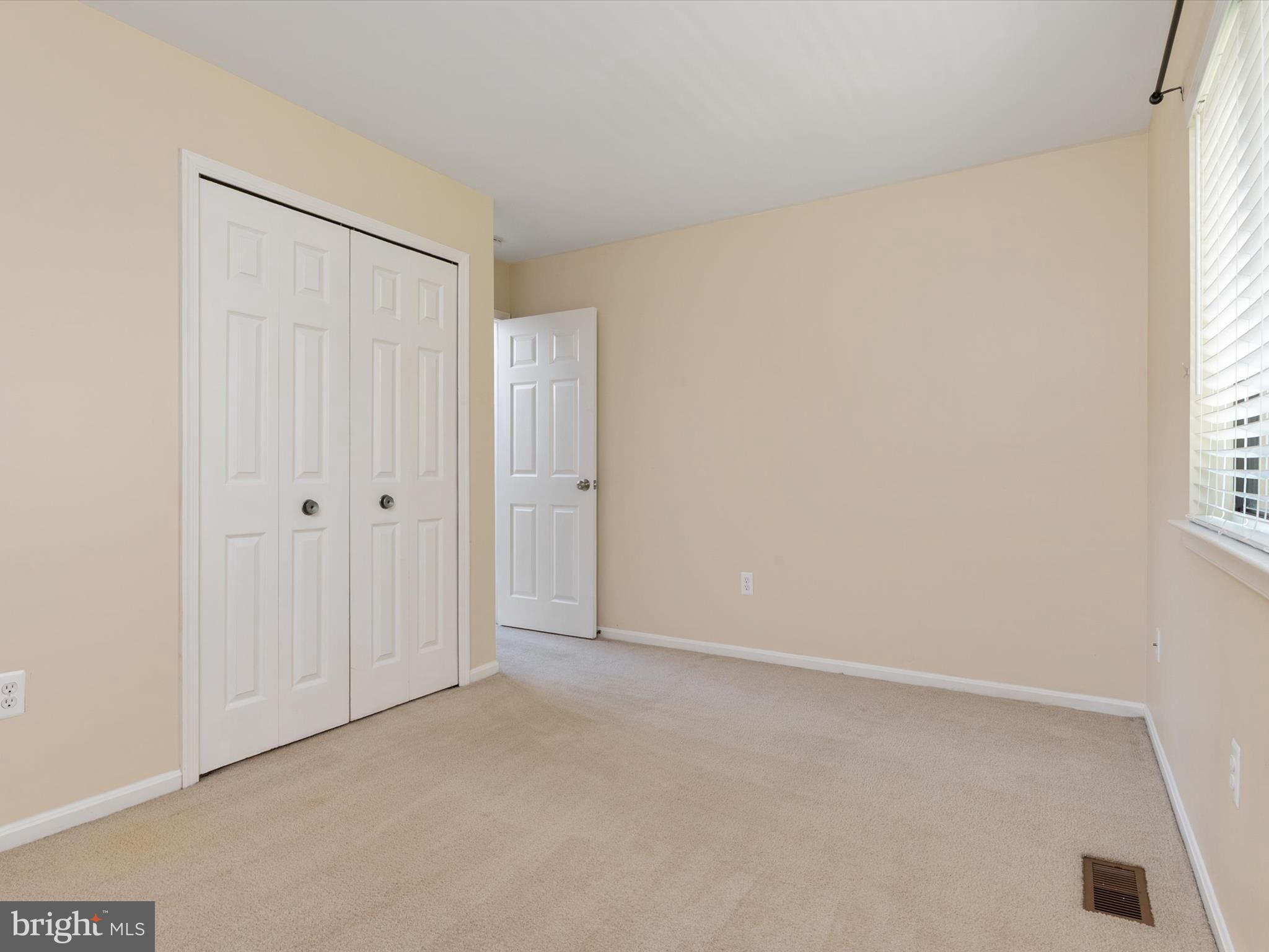 1411 Stonecreek Road Annapolis, MD 21403 - Photo 31 of 38 a view of an empty room with a window